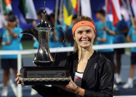 Tennis - Dubai Open - Women's Singles Final - Caroline Wozniacki of Denmark v Elina Svitolina of Ukraine - Dubai, UAE - 25/2/2017 - Elina Svitolina of Ukraine holds her trophy at the end of the match. REUTERS/Stringer