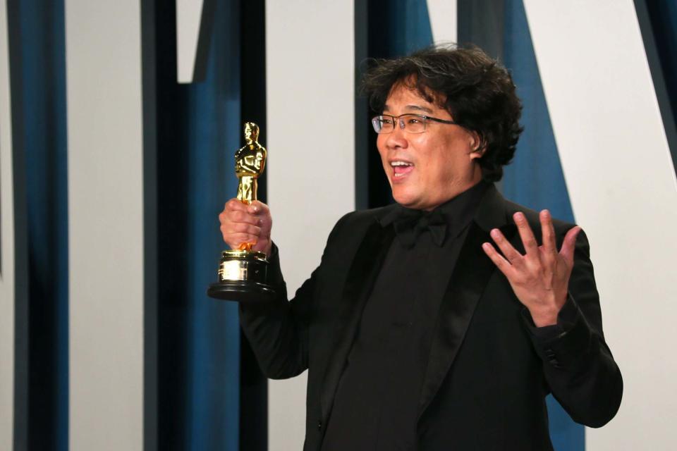 2020’s Best Director Bong Joon Ho will return as a presenterAFP via Getty Images