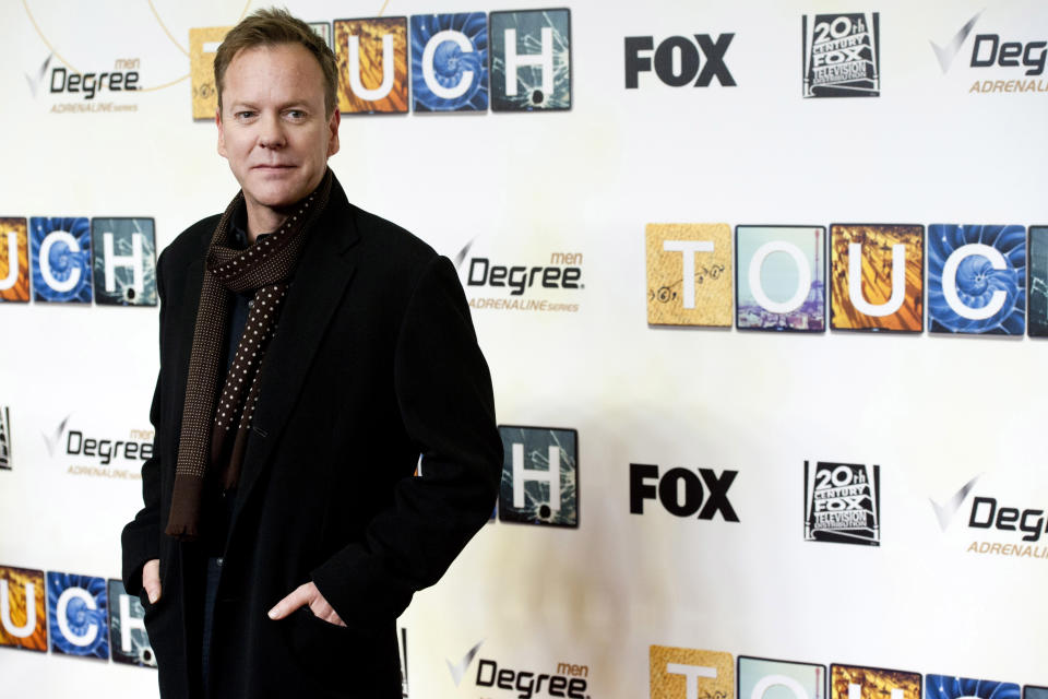 In this March 18, 2012 photo, Kiefer Sutherland attends the premiere of the new Fox series "Touch" in New York. Sutherland plays the father of an emotionally challenged child in the new series "Touch," premiering on Thursday at 9 p.m. EST on Fox. (AP Photo/Charles Sykes)