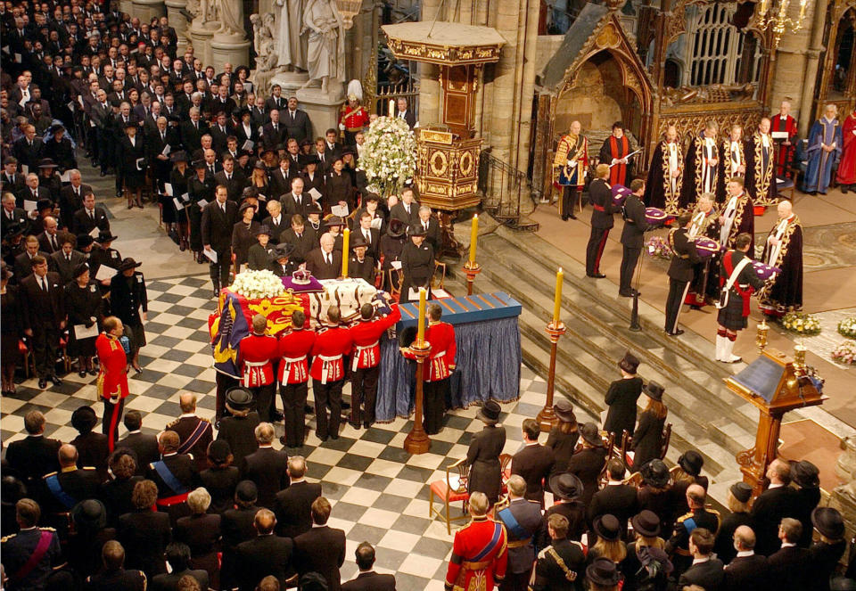 The coffin of Queen Elizabeth the Queen Mother is placed on catafalque at Westminster Abbey. Following the funeral service the Queen Mother's coffin will be taken to St George's Chapel in Windsor, where she will be laid to rest next to her husband, King George VI.  