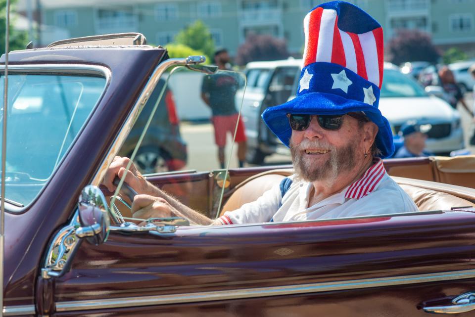 Jack Cipriano drives a 1939 4 for Plymouth convertible  during the Southampton Days Independence Day Parade Monday, July 5, 2021 at Second Street Pike in Upper Southampton.