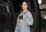 <p>Jenna Dewan shows off her famous abs in a denim on denim outfit as she hops in her awaiting car while in New York on March 28. </p>