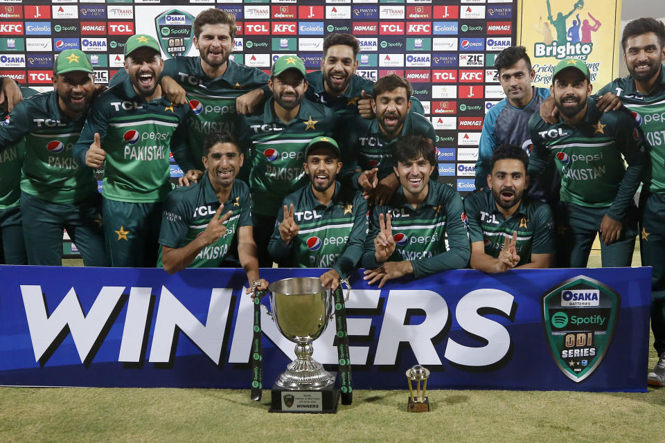 Pakistan's cricket team players pose for photographer with the ODI series trophy during a presentation ceremony on the end of third one day international cricket match between Pakistan and West Indies at the Multan Cricket Stadium, in Multan, Pakistan, Sunday, June 12, 2022. (AP Photo/Anjum Naveed)