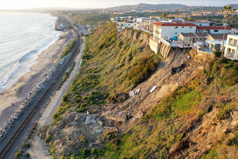 An aerial view of a hillside landslide brought on by heavy rains in San Clemente on March 16.