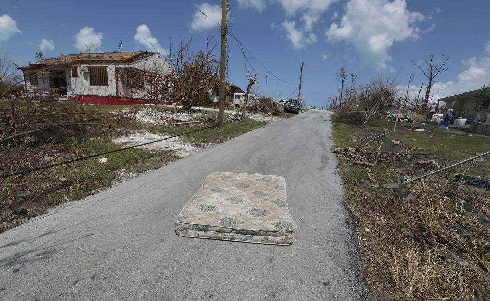 A mattress lays in the middle of a road in the aftermath of Hurricane Dorian in Marsh Harbor, Abaco Island, Bahamas, Saturday, Sept. 7, 2019. Search and rescue teams were still trying to reach some Bahamian communities isolated by floodwaters and debris Saturday after Dorian struck the northern part of the archipelago last Sunday. (AP Photo/Fernando Llano) (AP Photo/Fernando Llano)