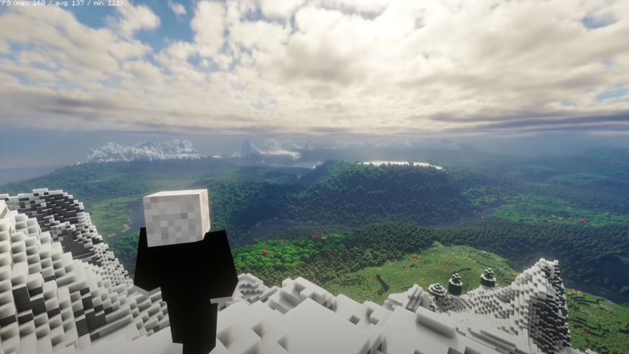  Minecraft character looks out at a view from the top of a mountain. 