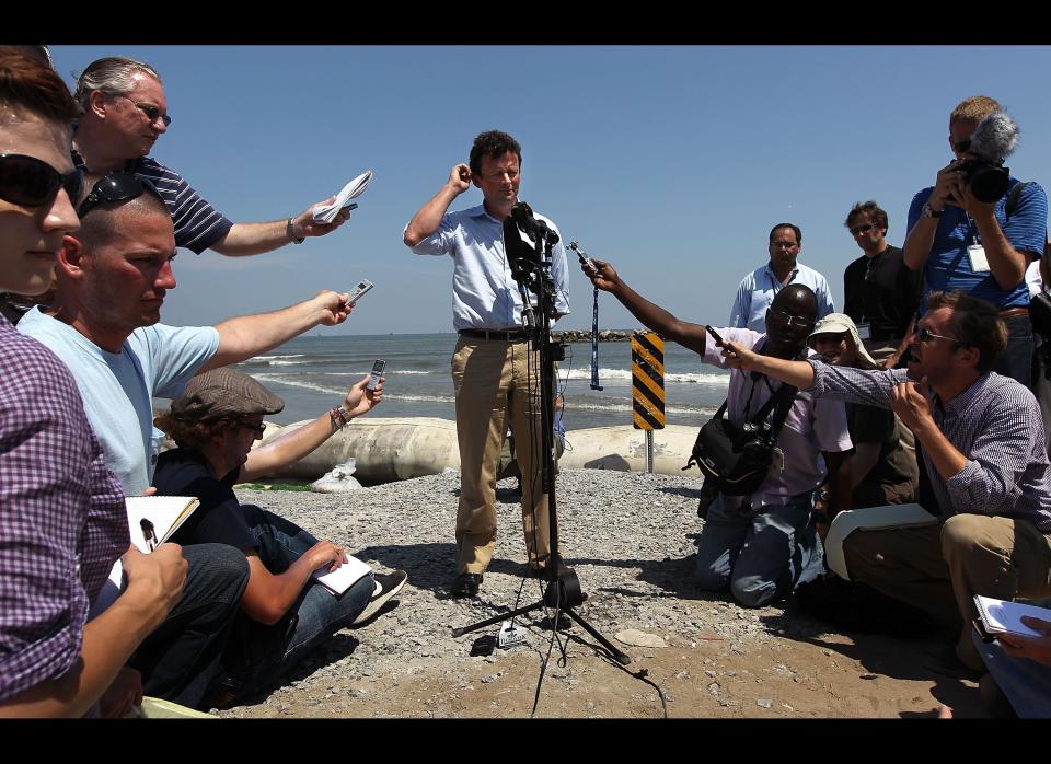 BP CEO Tony Hayward (C) answers questions from the media on an oil-stained beach on May 24, 2010 at Port Fourchon, Louisiana. Hayward said that BP is doing everything possible to clean up the massive oil spill still gushing into the Gulf of Mexico. Officials now say, however, that it may be impossible to clean the hundreds of miles of coastal wetlands and islands affected.  (John Moore, Getty Images)