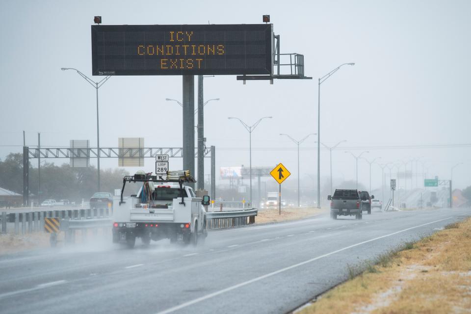 An electronic Texas Department of Transportation highway sign warns Lubbock area drivers of icy road conditions.