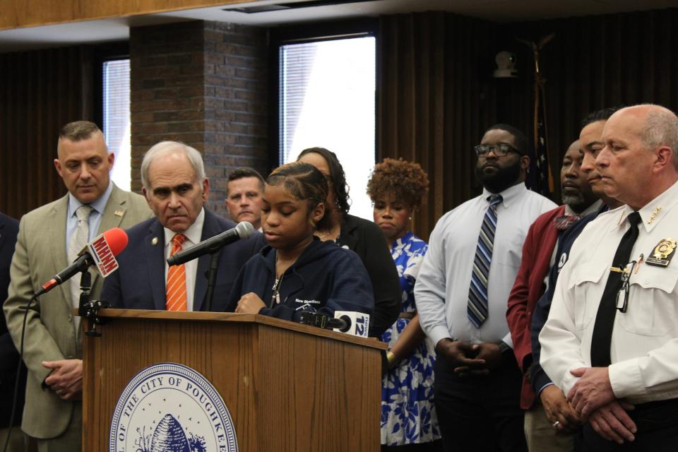 Youth spokesperson for the City of Poughkeepsie Nubian Directions, Aniyah Moreira, at the podium, speaks out against gun violence Thursday, May 2, 2024 at the Poughkeepsie City Hall Common Council Chambers.