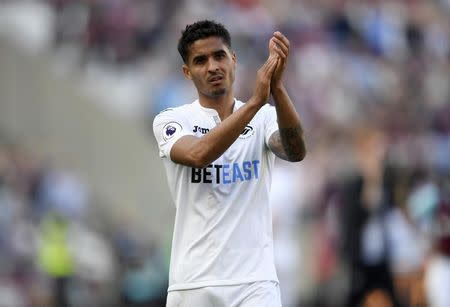 Britain Football Soccer - West Ham United v Swansea City - Premier League - London Stadium - 8/4/17 Swansea City's Kyle Naughton applauds fans after the match Action Images via Reuters / Tony O'Brien Livepic