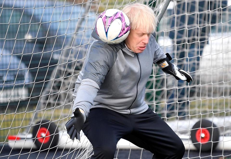 PM Boris Johnson using his head during a game of football (Getty Images)