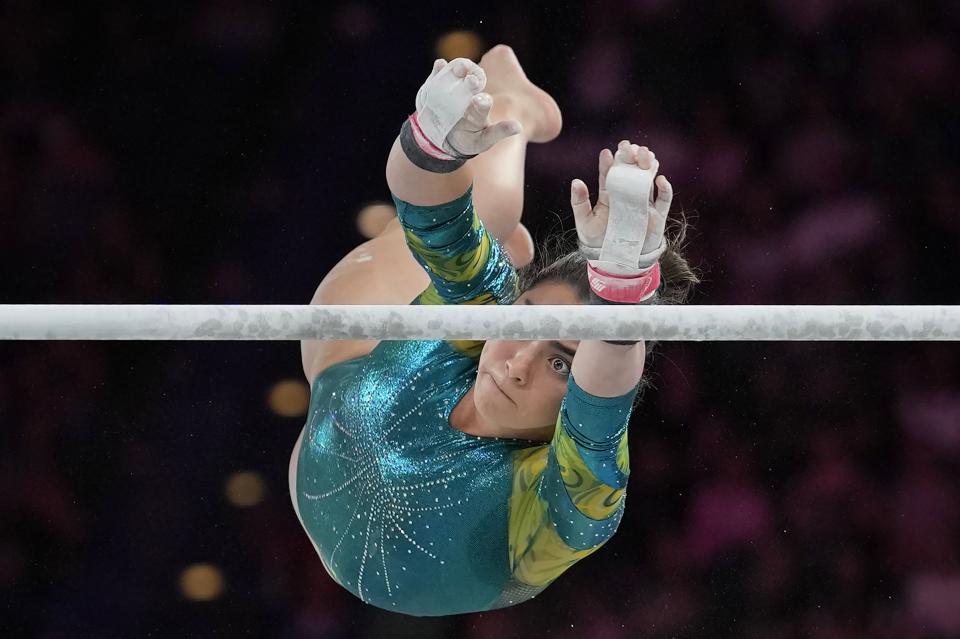 Georgia Godwin of Australia performs on Uneven Bars during the women's all-around finals at the Commonwealth Games, in Birmingham, England, Sunday, July 31, 2022. Godwin won the Gold medal. (AP Photo/Manish Swarup)