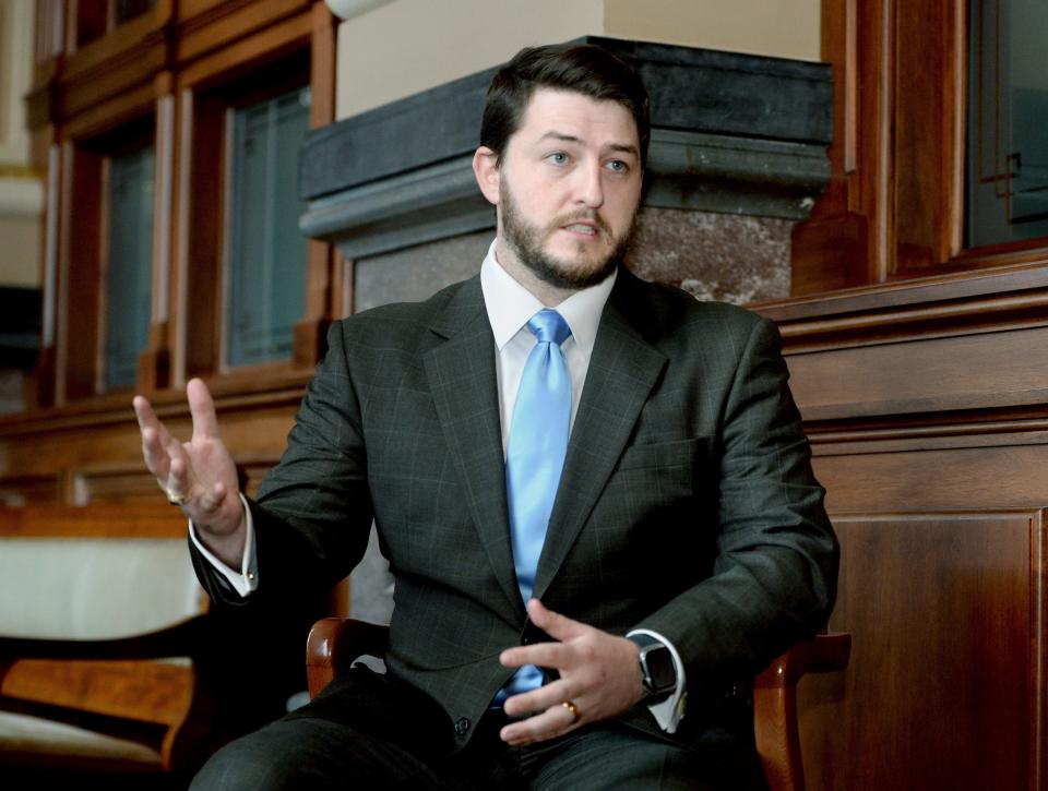 GOP candidate in IL-13 Joshua Loyd answers a reporter's questions at the Illinois state Capitol Thursday, February 1, 2024.