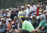 U.S. golfer Bubba Watson stands near his ball before making a shot on the 18th hole during the second round of the Masters golf tournament at the Augusta National Golf Club in Augusta, Georgia April 11, 2014. REUTERS/Mike Segar (UNITED STATES - Tags: SPORT GOLF)