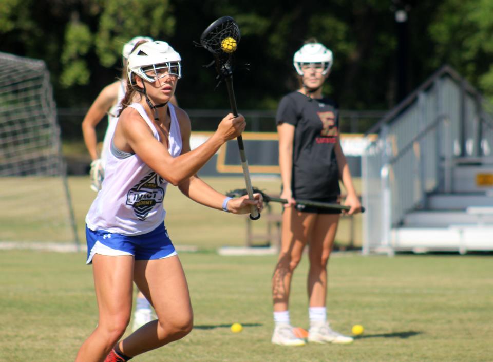 Episcopal's Sofia Chepenik catches a pass during high school girls lacrosse practice on May 2, 2022. [Clayton Freeman/Florida Times-Union]