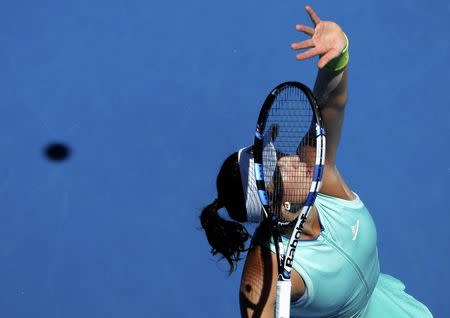 Tennis - Australian Open - Melbourne Park, Melbourne, Australia - 24/1/17 Spain's Garbine Muguruza serves during her Women's singles quarter-final match against Coco Vandeweghe of the U.S. .REUTERS/Jason Reed