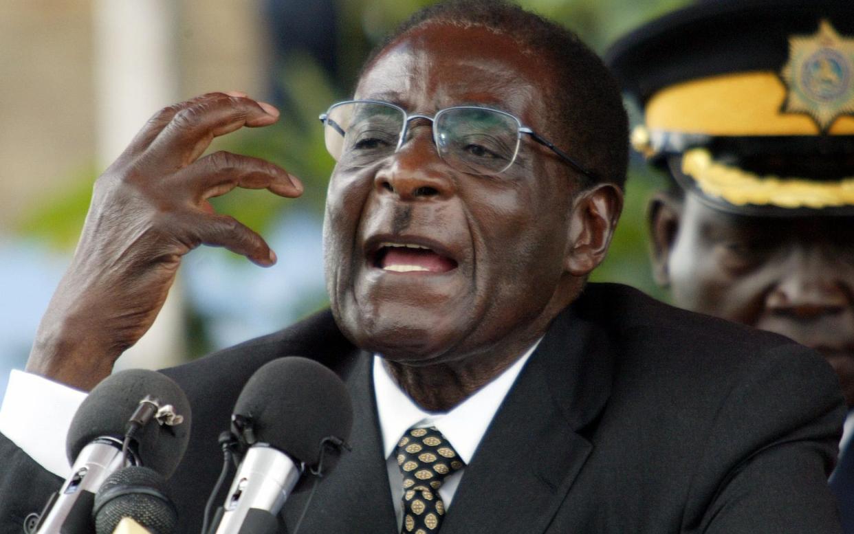 Face of a tyrant: Robert Mugabe has died aged 95, it was confirmed early today - Reuters