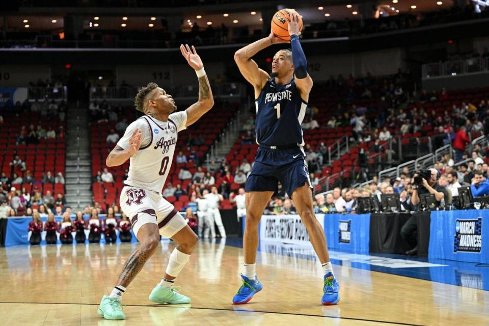 Penn State Nittany Lions guard Seth Lundy (1) controls the ball against Texas A&M Aggies guard Dexter Dennis (0) during the first half of Thursday’s game at Wells Fargo Arena.