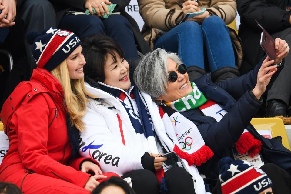 <p>Ivanka Trump (L), wife of Korean President Moon Jae-in, Kim Jung-sook (C) and Korean foreign minister Kang Kyung-wha (R)takes a selfie while watching the final of the men’s snowboard big air event at the Alpensia Ski Jumping Centre during the Pyeongchang 2018 Winter Olympic Games on February 24, 2018 in Pyeongchang. / AFP PHOTO / FRANCK FIFE </p>