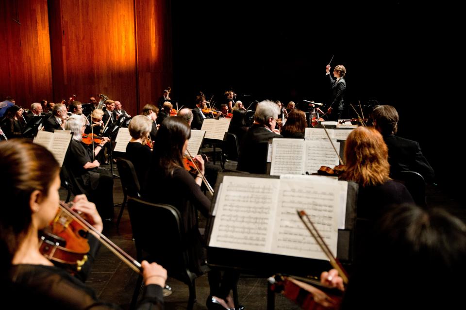 Musical Director Teddy Abrams and the Louisville Orchestra during a recent performance at the Kentucky Center.