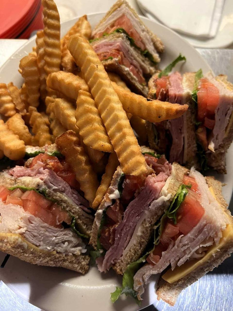 Malabu Pub Grill Club Sandwich Provided