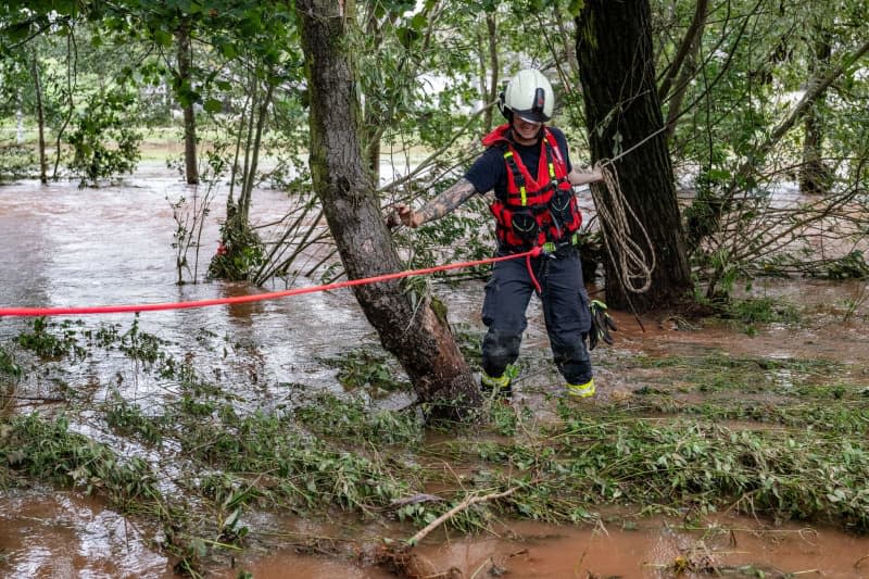 Emergency workers work after heavy rain and flooding in Otovice. Taneèek David/CTK/dpa