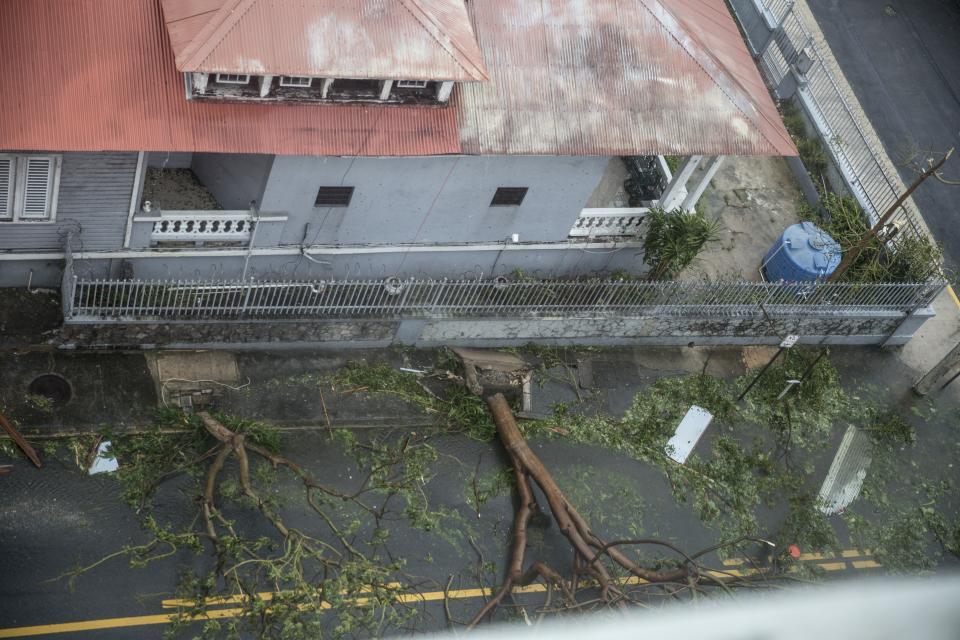 <p>Damage in the Miramar neighborhood is seen from inside the Ciqala hotel as Hurricane Maria bears down September 20, 2017 in San Juan, Puerto Rico. (Photo: Alex Wroblewski/Getty Images) </p>