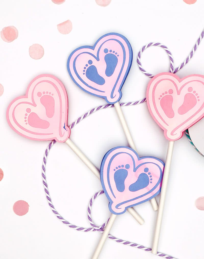 baby feet cupcake toppers, with feet in a heart shape, are a great baby shower idea