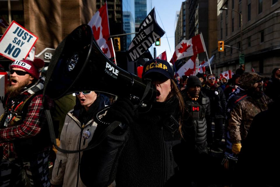 Demonstrators march throughout downtown Ottawa on Feb. 17, 2024, two years after the self-styled 'Freedom Convoy' blocked streets to protest against COVID-19 and other government rules.