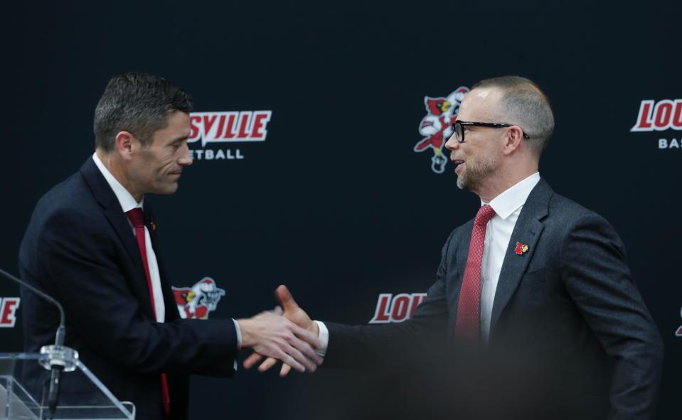 Athletics director Josh Heird, left, and men's basketball coach Pat Kelsey are looking to return the program to its former status as one of the sport's most profitable in the nation.