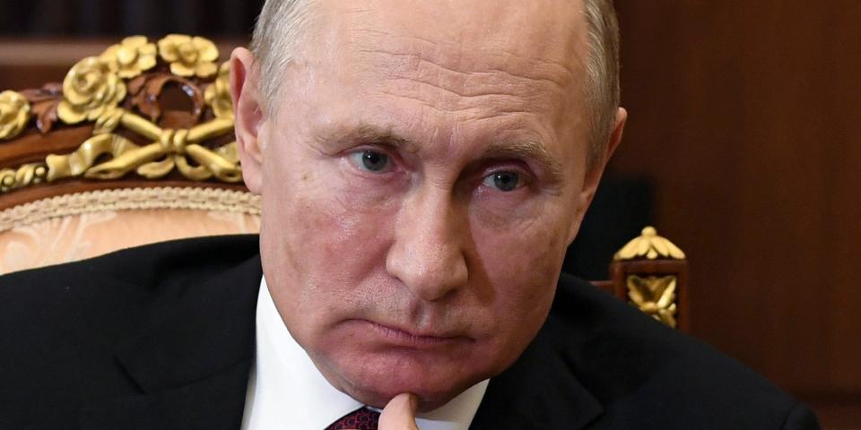 Russian President Vladimir Putin listens during a meeting in the Kremlin, in Moscow, Russia, Thursday, Nov. 19, 2020. (Alexei Nikolsky, Sputnik, Kremlin Pool Photo via AP)