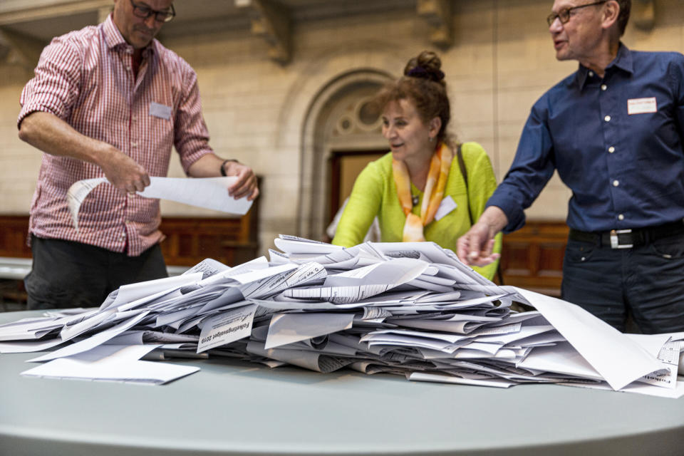 Ballots are counted after the polling stations closed in Copenhagen City Hall, Denmark, on the final day of the parliamentary elections in Denmark, Wednesday June 5, 2019. Denmark is holding a general election and unlike in other European countries, far-right populists don't seem to be on the rise here. The center-left Danish Social Democrats, in fact, may be making a comeback after four years in opposition. (Uffe Weng/Ritzau Scanpix via AP)