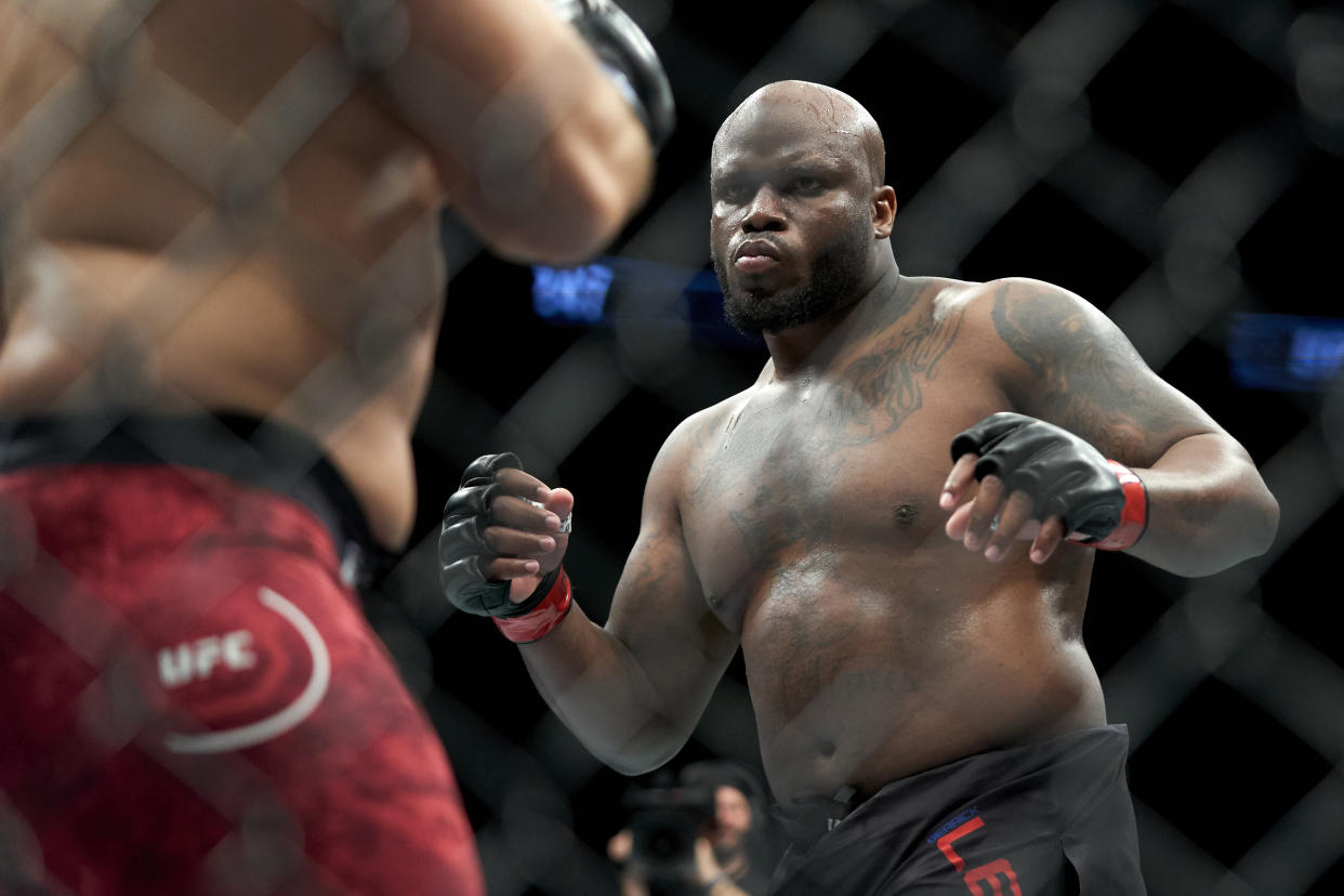 HOUSTON, TEXAS - FEBRUARY 08:  Derrick Lewis battles Ilir Latifi of Sweden during the UFC 247 event at Toyota Center on February 08, 2020 in Houston, Texas. (Photo by Cooper Neill/Zuffa LLC via Getty Images)