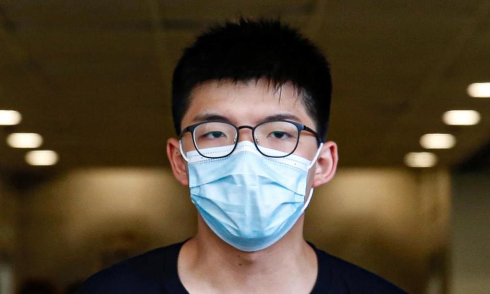 Joshua Wong arrives at court on 6 July after being charged on suspicion for organising illegal protests in Hong Kong.