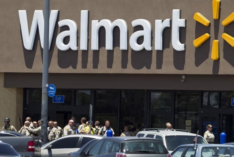 Metro Police officers are shown outside a Walmart after a shooting in Las Vegas June 8, 2014. REUTERS/Las Vegas Sun/Steve Marcus