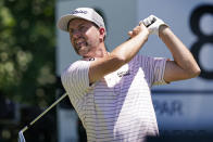 Webb Simpson hits off the eighth tee during the first round of the Charles Schwab Challenge golf tournament at the Colonial Country Club, Thursday, May 26, 2022, in Fort Worth, Texas. (AP Photo/Tony Gutierrez)