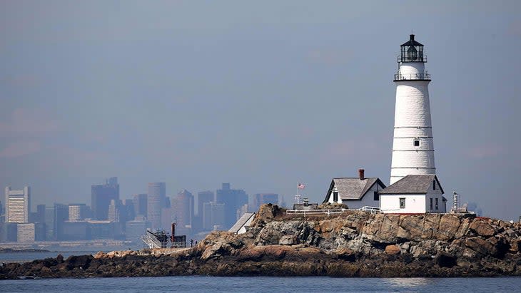 <span class="article__caption">The 300-year-old Boston Light, the country’s first lighthouse, is located on Little Brewster Island in the Boston Harbor. It is two miles from Graves and allows tours. </span> (Photo: David L. Ryan/The Boston Globe/Getty)