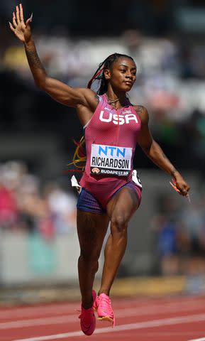 <p>Shaun Botterill/Getty </p> Sha'Carri Richardson of Team United States competes in the Women's 100m Heats during day two of the World Athletics Championships Budapest 2023