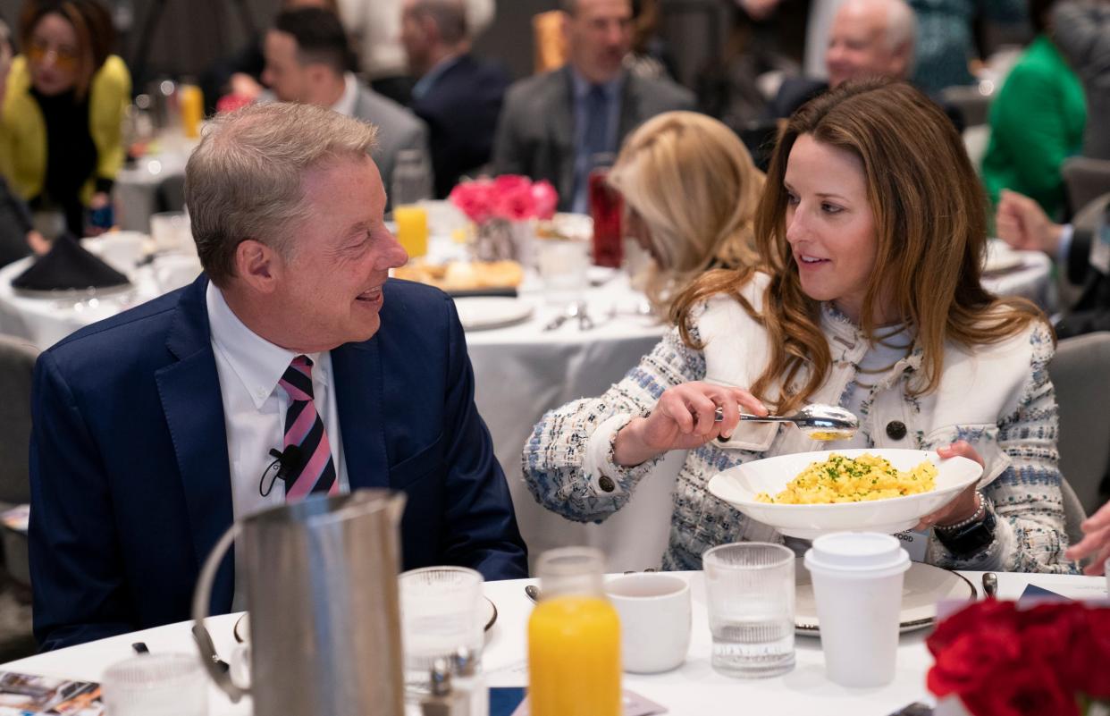 Executive Chair of Ford Motor Company, William Clay Ford Jr., left, shares a moment with his daughter Alexandra Ford English, who serves on the Ford board of directors, during the Detroit Free Press Breakfast Club on Wednesday April 17, 2024 at the Daxton Hotel in Birmingham.