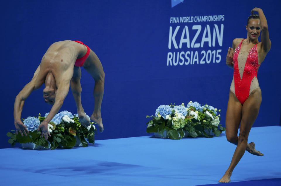 Christina Jones and Bill May of the U.S. perform in the synchronised swimming mixed duet technical final at the Aquatics World Championships in Kazan, Russia, July 26, 2015. REUTERS/Michael Dalder