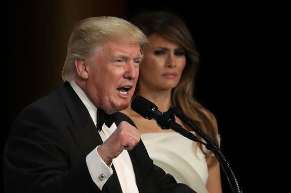 WASHINGTON, DC - JANUARY 20:  (L-R) President Donald Trump speaks as his wife First Lady Melania Trump looks on during A Salute To Our Armed Services Inaugural Ball at the National Building Museum on January 20, 2017 in Washington, DC. President Donald Trump was sworn in as the 45th President of the United States today.  (Photo by Alex Wong/Getty Images)