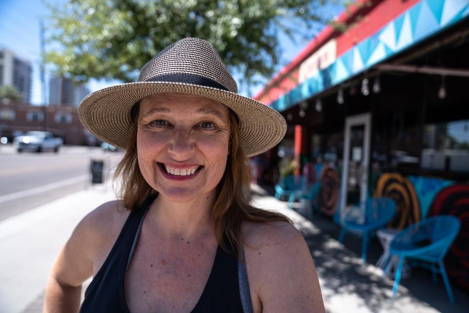 Carly Logan, owner of Carly's Bistro, poses for a portrait outside their restaurant on Roosevelt Street in Phoenix on April 10, 2024.