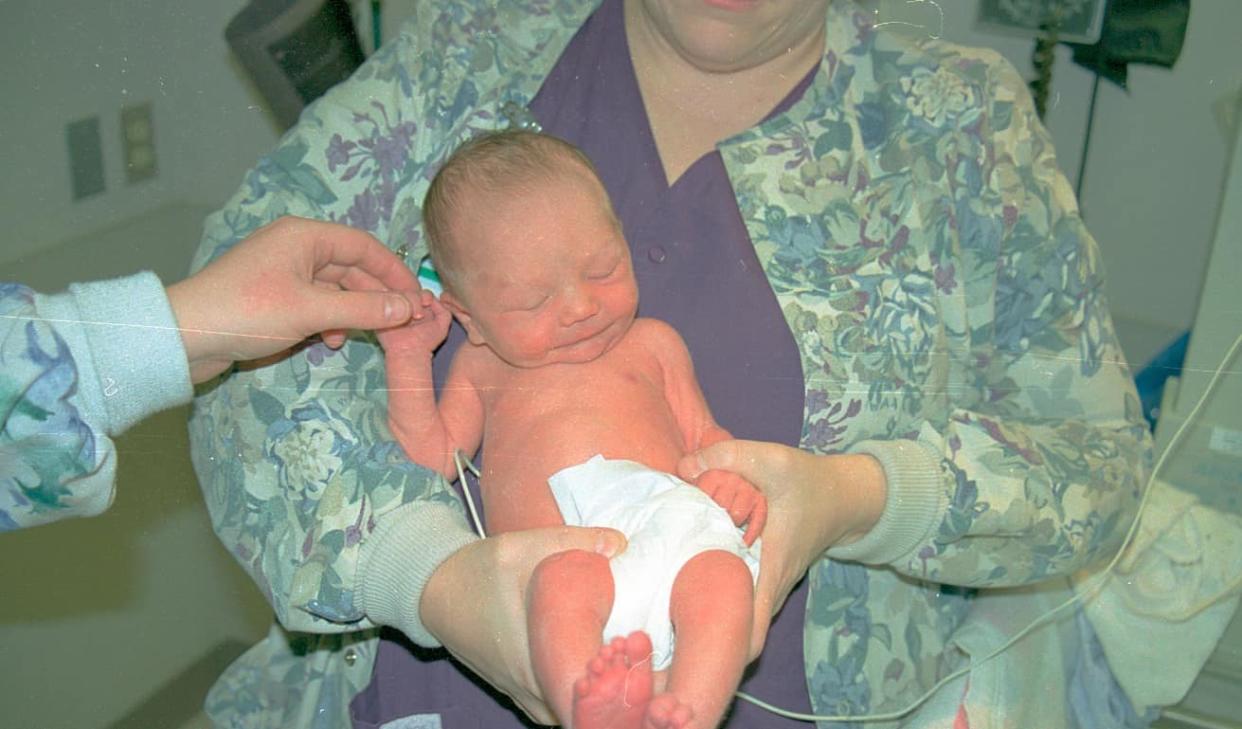 Newborn baby in the hospital after being abandoned, Dec. 22, 2000