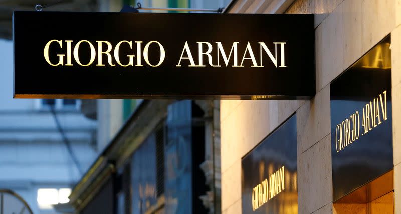 FILE PHOTO: A company logo is pictured outside a Giorgio Armani store in Vienna