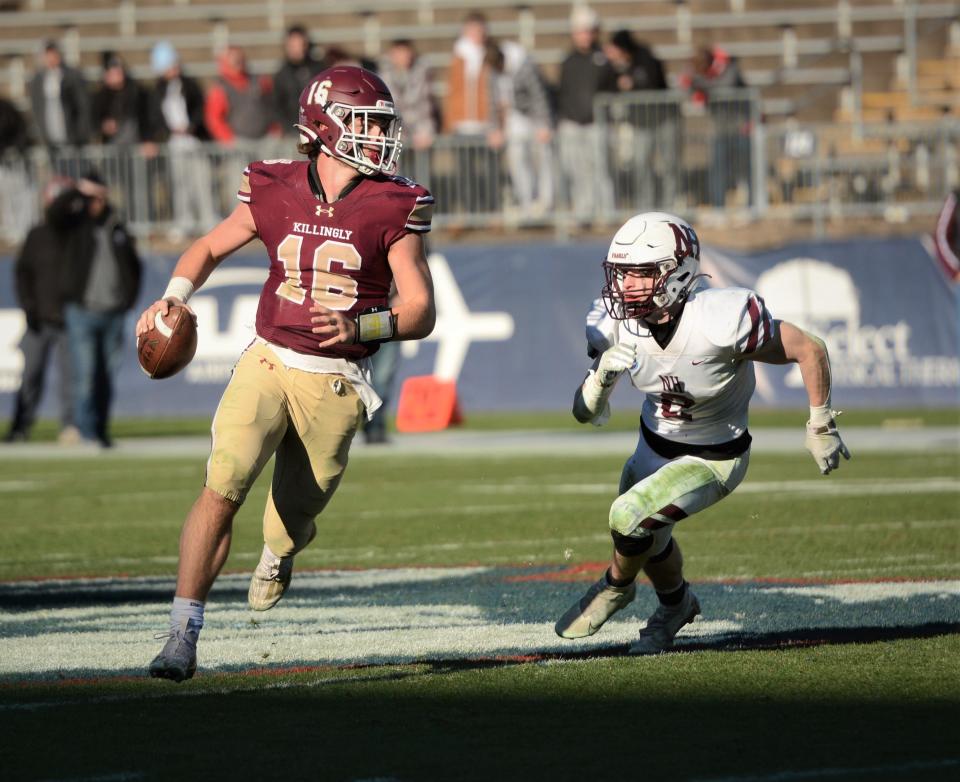 Killingly senior quarterback Thomas Dreibholz looks downfield against North Haven during Saturday's Class MM championship game at Rentschler Field in East Hartford.