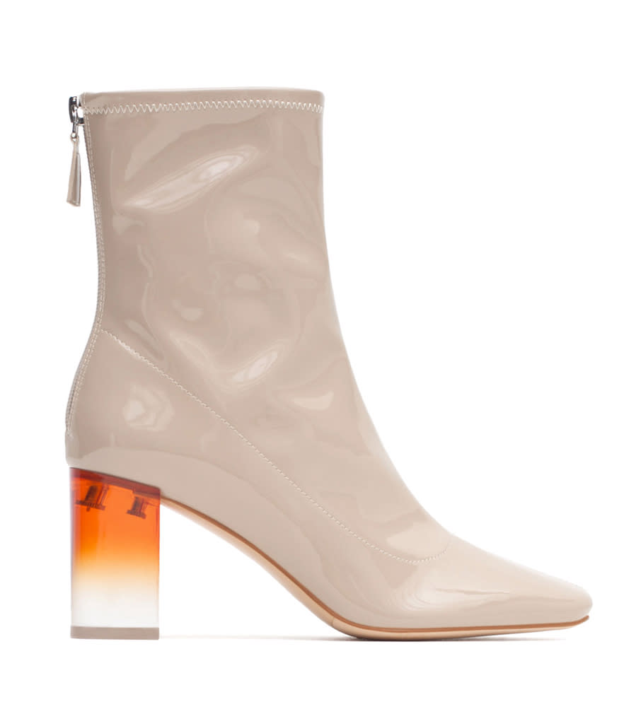 <p>Zara High Heeled Patent Bootie, $119, <a rel="nofollow noopener" href="http://www.zara.com/us/en/woman/shoes/view-all/high-heeled-patent-bootie-c734142p2846651.html" target="_blank" data-ylk="slk:zara.com;elm:context_link;itc:0;sec:content-canvas" class="link ">zara.com</a></p>