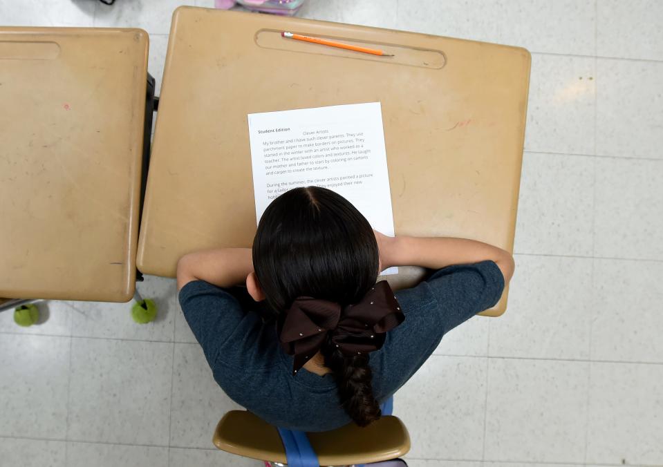 A student works on a reading assignment at Dodson Elementary School on June 6, 2023, in Nashville.