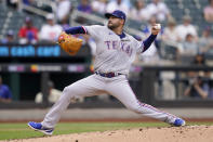 Texas Rangers starting pitcher Martin Perez (54) throws in the first inning of a baseball game against the New York Mets, Saturday, July 2, 2022, in New York. (AP Photo/John Minchillo)