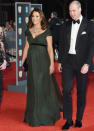 It's nearly BAFTA time again so get ready for all those show-stopping gowns, dazzling jewels and high heel heaven. The red carpet is all about A-listers' outfit choices, but don't forget some of our favourite royals often attend too, giving us a double hit of glamour. The Duchess of Cambridge has graced the BAFTAs twice over the years, in 2017 and 2018, as well as popping into the BAFTA Brits to Watch event way back in 2011. All of her outfits have been stunning, so as 2019 ceremony draws near, we decided to relive Kate's past BAFTA looks – the designer dresses, jewellery, shoes and bags. Enjoy! The Duchess wore this breath-taking black patterned off-the-shoulder gown by Alexander McQueen to the 2017 BAFTAs. Didn't she look amazing? The dress featured a Bardot neckline, bodice and full-length skirt with stylish ribbon detailing.