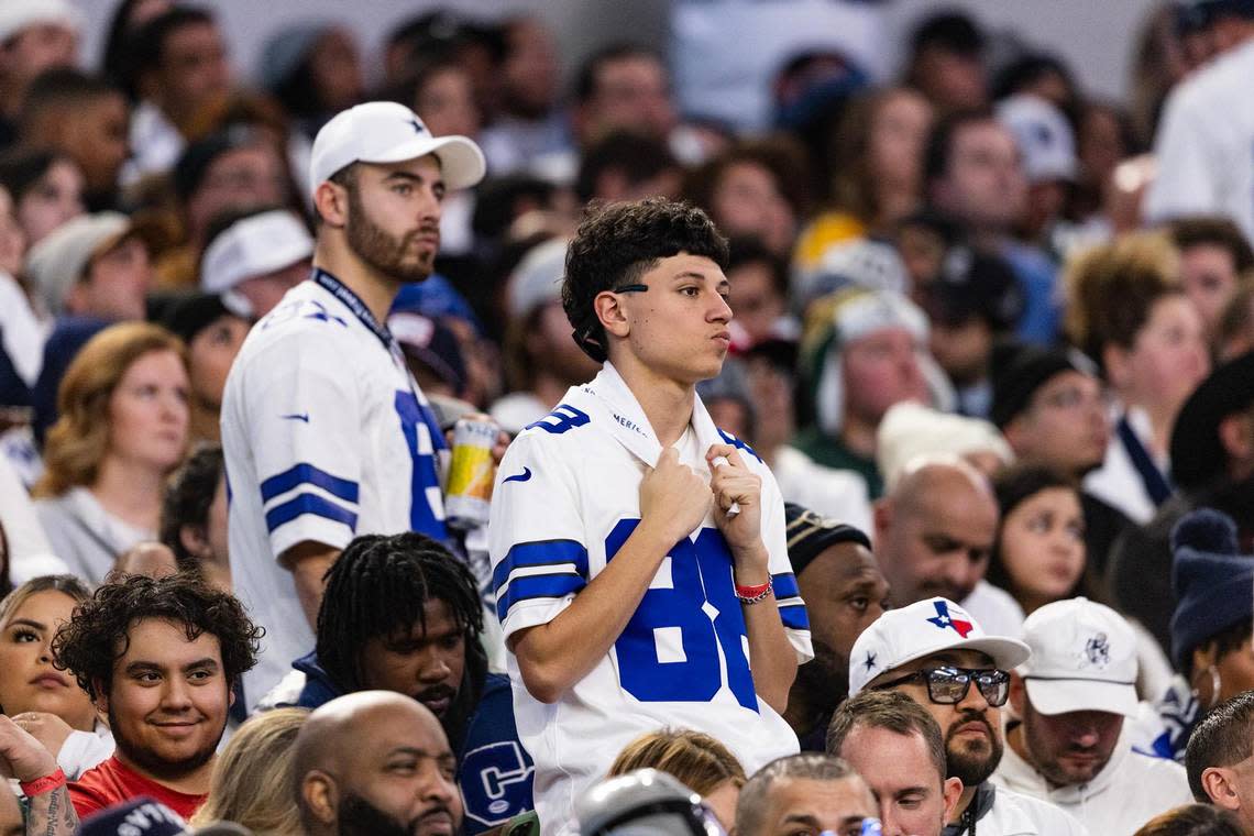 A Cowboys fan looks on in disappointment during the second quarter of the NFC Wild Card game between the Dallas Cowboys and the Green Bay Packers at AT&T Stadium in Arlington on Sunday, Jan. 14, 2024.